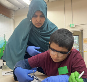Mom and son dissecting