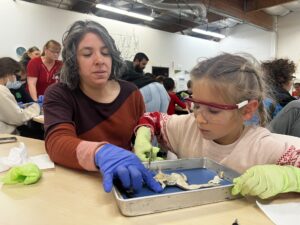 Homeschool mom helping student